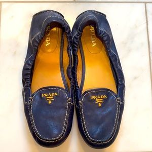 Gently used Prada navy blue loafer, like new.